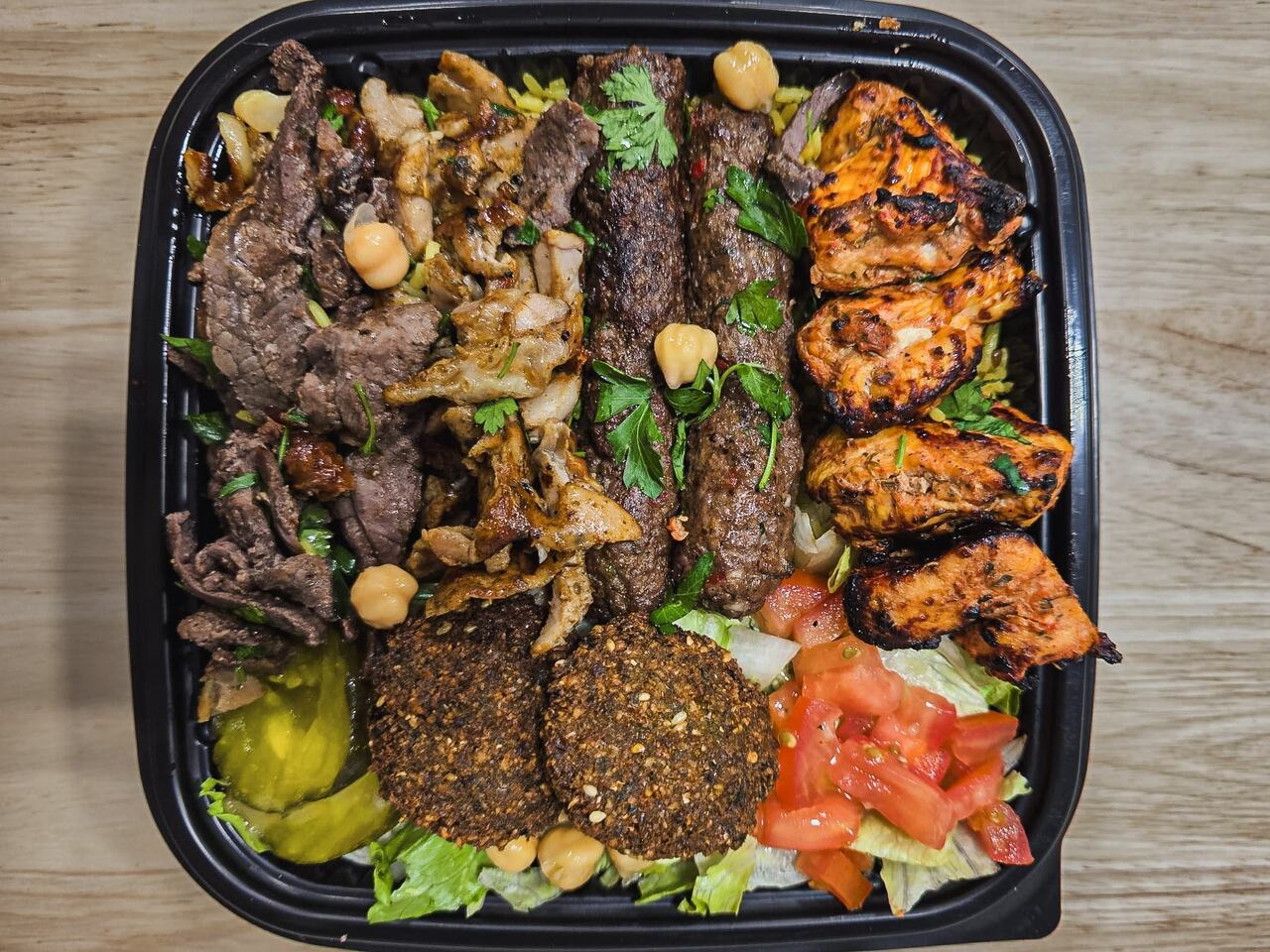 Mixed grill platter — kofta, chicken kebab, shawarma, falafel, rice and salad